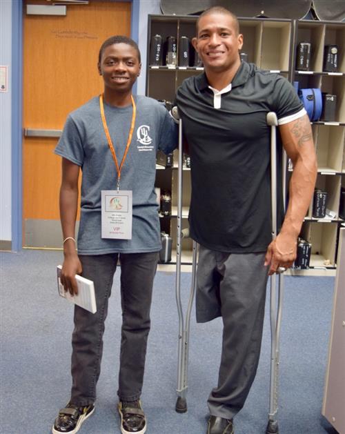 Anthony with student