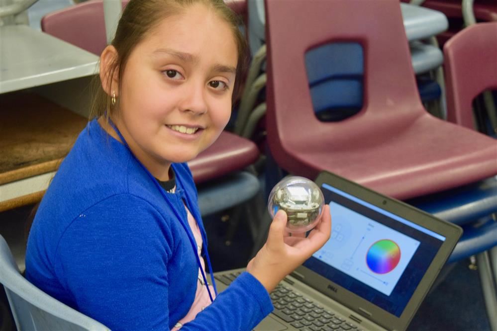 Girl holding a sphere
