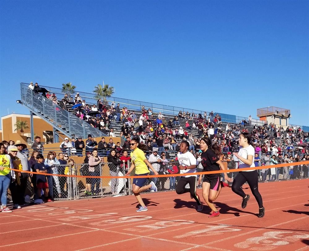 Scholars running on track