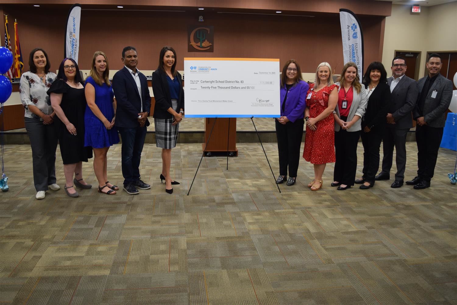  Check Presented to Cartwright Administrators